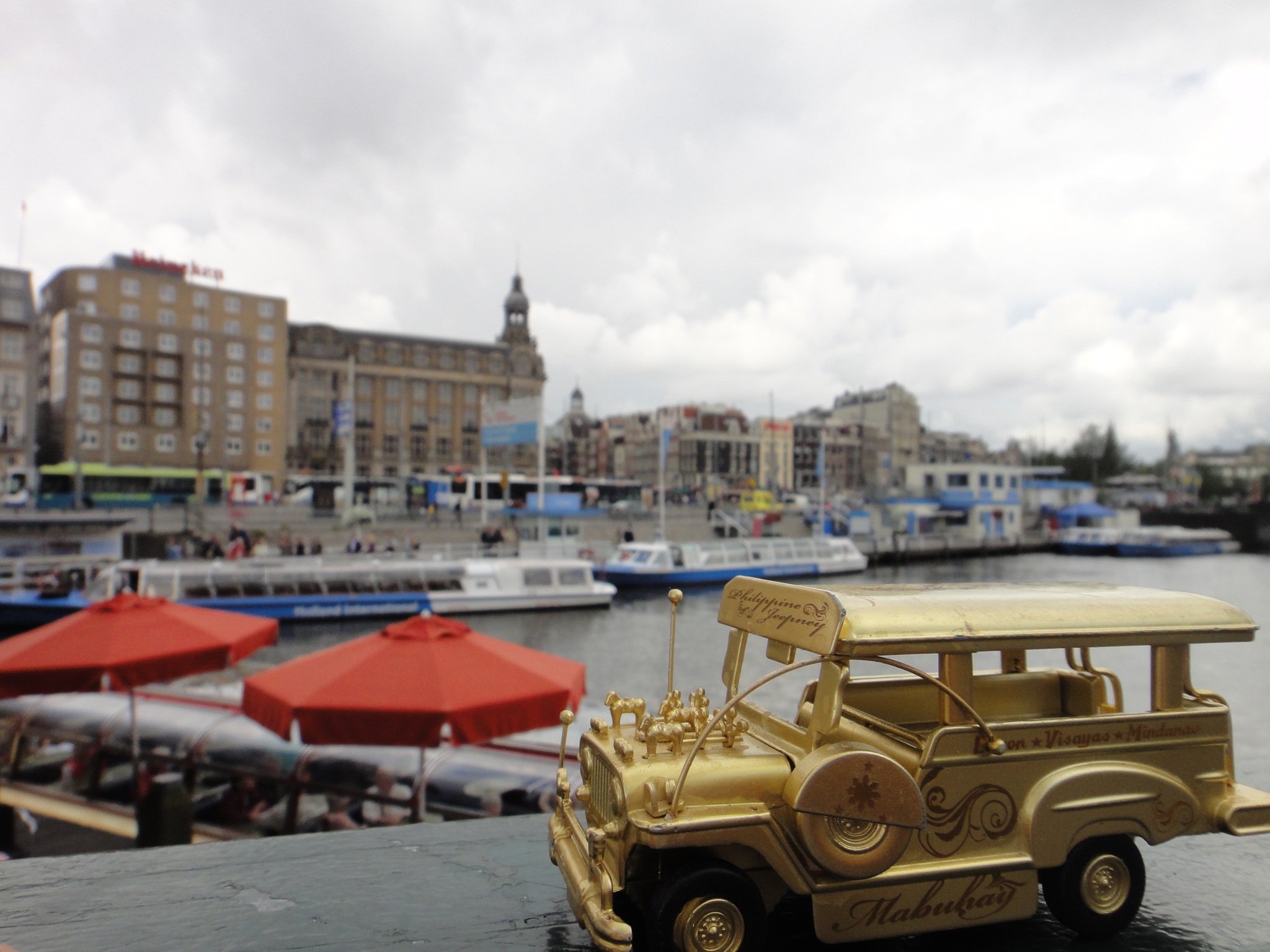 Golden jeepney on the Amsterdam waterfront