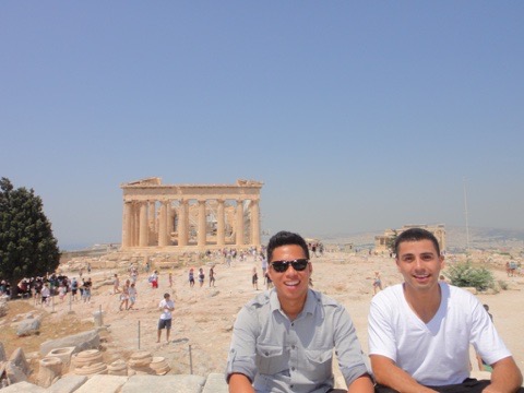 Travelers at the Acropolis with the Parthenon behind them