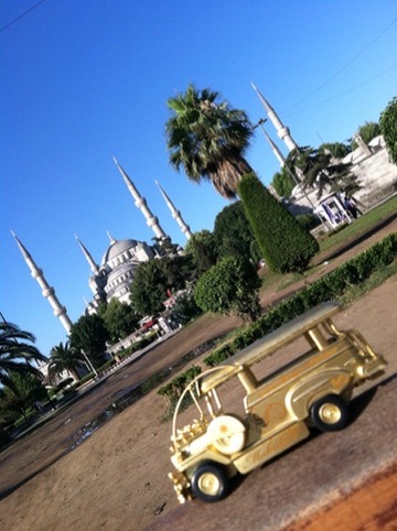 Golden jeepney before the Blue Mosque in Istanbul