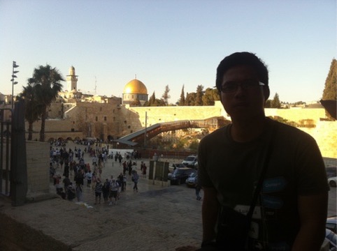 Traveler overlooking the Western Wall plaza and Dome of the Rock