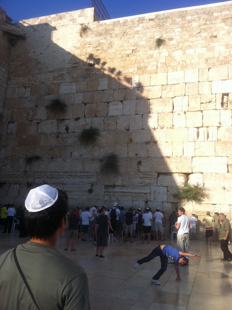 Traveler wearing a kippah at the Western Wall